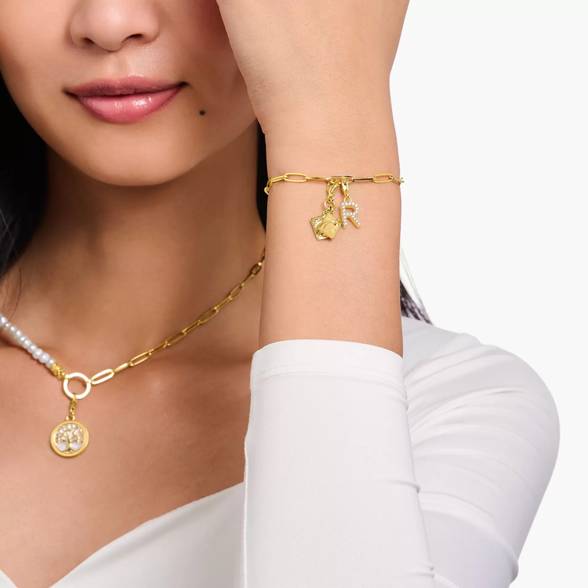 THOMAS SABO Charms | Charms<CHARM-H&AUML;NGSMYCKE BOKSTAVEN F MED VITA STENAR GULDPL&AUML;TERAD vit, gult guldfargad
